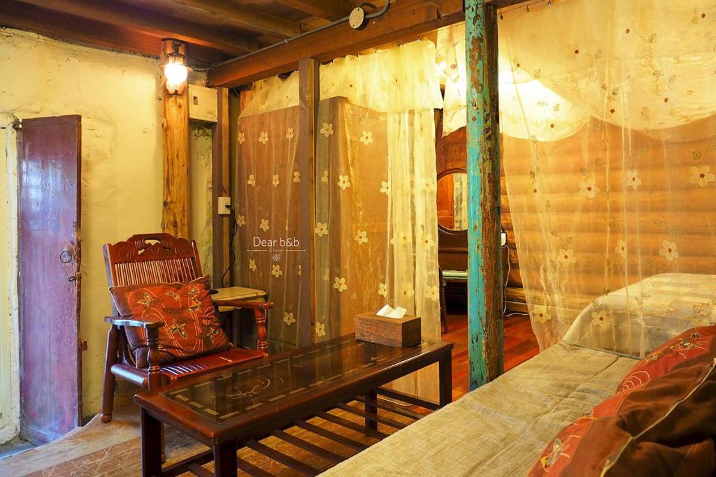Апартаменты Qi Tang Lane Цзюфэнь Номер фото